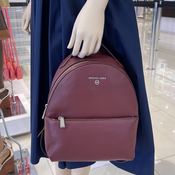 Michael Kors Women's Valerie Medium Pebbled Leather Backpack
NWT - Picture 13 of 16